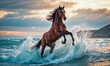 horse rearing in the raging waves of the sea coast at sunset