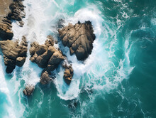 Aerial View Of Sea Waves Crashing On The Rocks, Aerial View Of A Rocky Coastline With Waves Breaking On It.