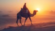 © sirisakboakaew - Camel and Rider. Indian camel rider pauses in the setting sun in Jaisalmer, Rajasthan
