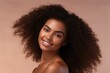 © Anatolii - Black History Month, african american girl beauty portrait, clean healthy skin on beige background. Smiling beautiful woman. Curly hair
