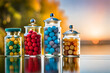 assortment of colorful candies in glass jars