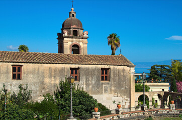 Wall Mural - Close-up view of ancient Church of San Pancrazio against clear blue sky. It located just outside the city walls. Travel and tourism concept