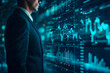 © Moritz - business man in front of digital display, trading chart of stock market, data analytics