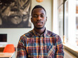 © koala studio - Portrait of young african american man in casual clothes at office
