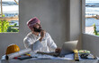 © Jack Tamrong - Modern Arab businessman working on notebook computer thinking about new project