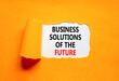 © Dzmitry - Business solutions of the future symbol. Concept words Business solutions of the future on beautiful orange paper. Beautiful brown paper background. Business solutions of the future concept Copy space