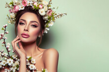Photo Of A Woman Spring Queen Wear Crown With Blooming Flowers On Pastel Green Background. Ai Generative