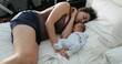 © Marco - Candid real life newborn baby sleeping with mother in bed