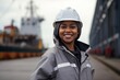 Confident Female Engineer with Hard Hat at Industrial Port