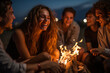 Youthful laughter and camaraderie during a beach bonfire, illustrating the social and leisure-oriented aspects of contemporary youth culture.