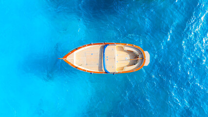 Wall Mural - Drone view of a motor boat. Luxury transportation. Vacation and holidays. Summer time for sea travel. The sea bay. Photo for background and wallpaper. Mediterranean Sea.