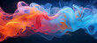 Flamboyant and colorful smoke on a dark background.