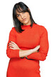 © Krakenimages.com - Young hispanic woman wearing casual clothes skeptic and nervous, disapproving expression on face with crossed arms. negative person.