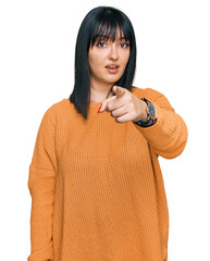 Sticker - Young hispanic woman wearing casual clothes pointing displeased and frustrated to the camera, angry and furious with you