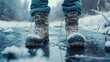 A person standing in the snow wearing a pair of boots. Suitable for winter-themed designs and outdoor activities
