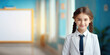 © Julia Zarubina - small beautiful girl in a school uniform against the background of a classroom, education, learning, child, kid, schoolgirl, student, pupil, smart person, portrait, face, knowledge, children, smiling