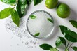 Citric Acid on White Background with Green Leaves