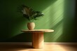 Contemporary, simple wood table with round top featuring a tropical palm bathed in sunlight against a green wall. Generative AI