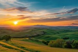 Fototapeta Na ścianę - A panoramic landscape of rolling hills Picturesque countryside And a vibrant sunset