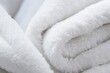 Background consisting of a white towel with a flat and smooth texture made from cotton fiber material that resembles fabric or textile This towel appears plush fluffy dry soft and im