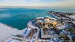 Chicago, IL USA January 15th 2024:Aerial drone footage of Chicago Adler Planetarium during winter time with below zero temperatures.  the area is empty due to cold weather  