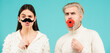Concept of gender equality, equal rights for both sexes. Male female portrait. Funny couple of woman with moustache and man with red lips. Diversity, tolerance and gender identity concept.