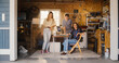 © Gorodenkoff - Diverse Team Of Three Young Startup Company Founders In Retro Garage With Old Desktop Computer. Male And Female Entrepreneurs Looking At Camera And Smiling, Developing Online Service In Nineties.