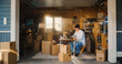 © Gorodenkoff - Caucasian Businessman Using Laptop Computer In Garage. Male Small Business Owner Filling Orders From Online Customers. Products In Cardboard Boxes Ready For Shipping. Entrepreneur Working At Home.