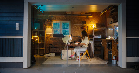 Fototapete - Hispanic Female Software Developer Programming On Old Desktop Computer In Retro Garage In the Evening. Woman Working On Innovative Online Service Startup Company In Nineties. Nostalgia Concept.