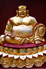 Wall Mural - Emperor Jade Pagoda (Chua Ngoc Hoang or Phuoc Hai Tu). Taoist temple. Happy smiling Buddha. Maitreya Buddha. Ho Chi Minh city. Vietnam.