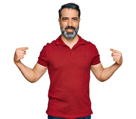 Sticker - Middle aged man with beard wearing casual red t shirt looking confident with smile on face, pointing oneself with fingers proud and happy.