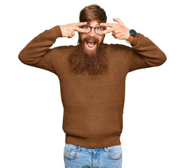 Poster - Young irish redhead man wearing casual clothes and glasses doing peace symbol with fingers over face, smiling cheerful showing victory