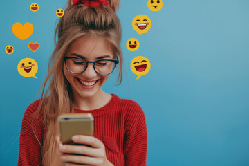 Happy woman with mobile phone and different smiling emoticons on pink background. social media, technology and people concept - smiling teenage girl