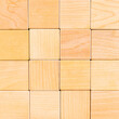 © PRO Balance - Wall, empty background of sixteen wooden cubes. copy space.