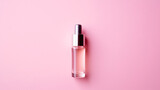 Fototapeta  - Cosmetic serum on pink background top view. Space
