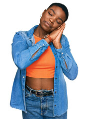 Poster - Young african american woman wearing casual clothes sleeping tired dreaming and posing with hands together while smiling with closed eyes.