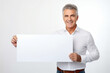 © AI_images_for_people - Happy mature senior man holding blank white banner sign, isolated studio portrait .