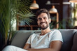 © AI_images_for_people - Satisfied handsome young man relaxing on the sofa at home, Smiling men enjoying day off lying on the couch, Healthy lifestyle, people and holiday concept.