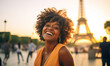 Happy African American woman travel in Paris, Cheerful Female near Eiffel Tower, Travel to Europe, Famous popular tourist place in world.