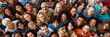 Leinwanddruck Bild - From directly above multi ethnic large group of people looking at camera