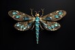 The dragonfly is made of precious metals and stones. Beautiful brooch isolated on black background