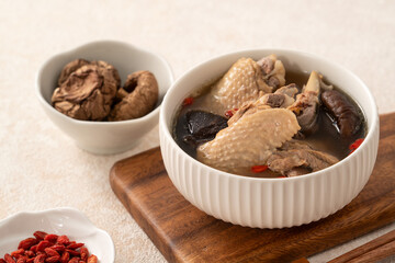 Wall Mural - Delicious shiitake mushroom chicken soup, traditional Taiwanese soup.