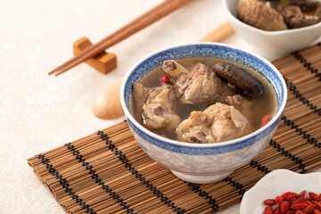 Wall Mural - Delicious shiitake mushroom chicken soup, traditional Taiwanese soup.