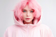 © olgakudryashova - Portrait of a beautiful young woman with curly pink hair in a pink down jacket
