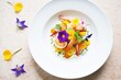 elegant plating of prawn curry with edible flowers