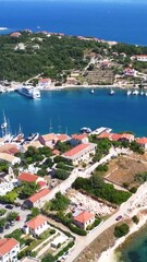 Wall Mural - Aerial drone panorama of Fiskardo village port on Kefalonia island, Greece