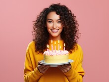 Happ Young Woman Holding A Big Birthday Cake With Candles