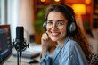 Happy girl host record podcast use microphone and wear headphone to interview guest conversation for content in her home studio