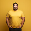 © DALU11 - Plus size man on yellow background.