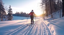 Cross Country Skier, Outdoors In The Snow During Winter. Concept Of Winter Sports And Activities. Young Woman Skiing.